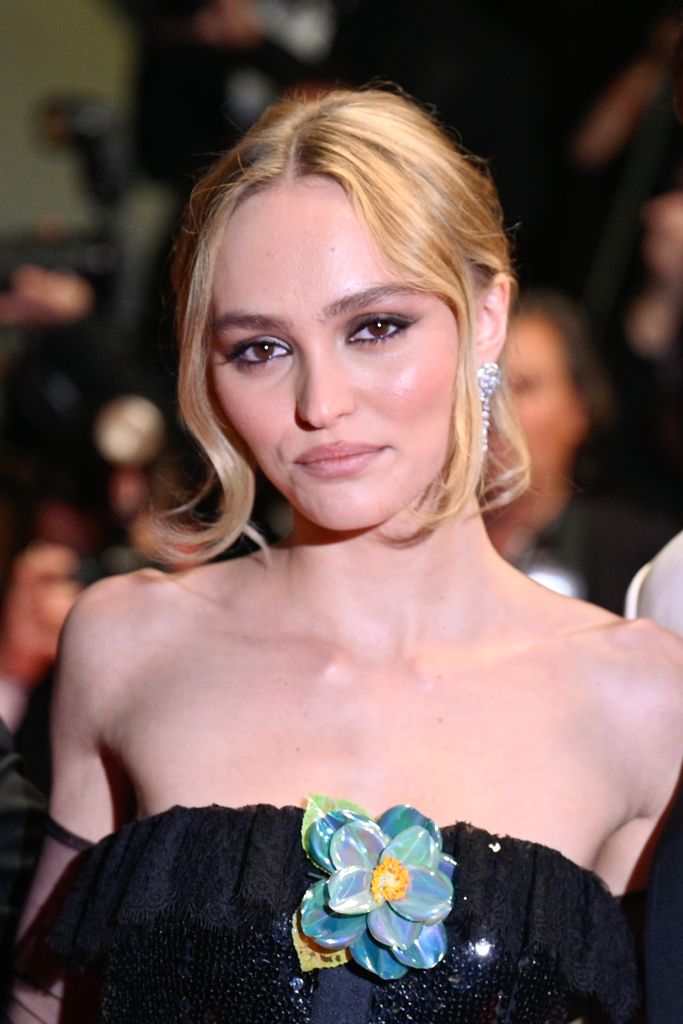 Lily-Rose Depp wore her hair in an unfussy updo for the premiere 