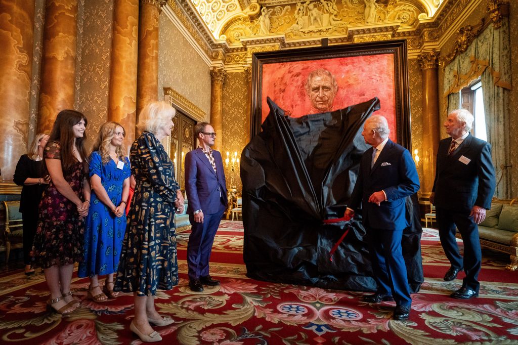 King Charles unveils portrait painting at Buckingham Palace