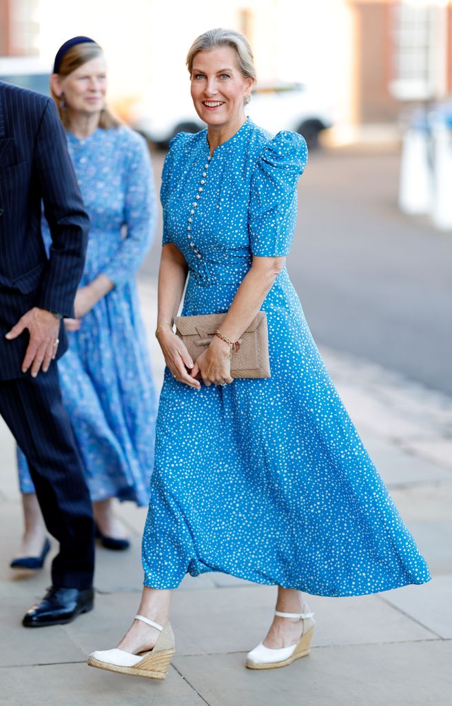 Duchess Sophie wearing a long polka dot blue dress and white shoes