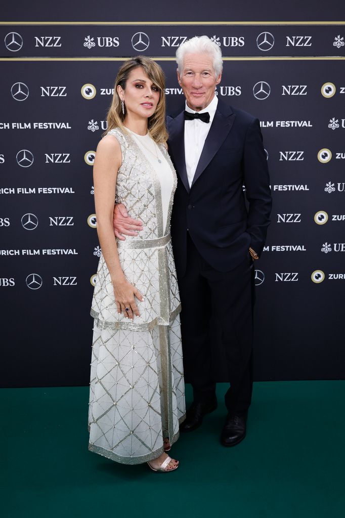 Alejandra Gere and Richard Gere attend the "Wisdom of Happiness" green carpet during the 20th Zurich Film Festival at Corso on October 08, 2024 in Zurich, Switzerland