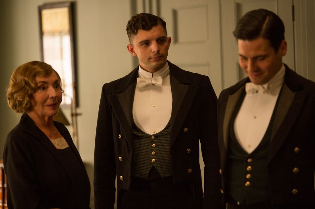 SUE JOHNSTON as Denker. MICHAEL FOX as Andy and ROBERT JAMES-COLLIER as Thomas in Downton Abbey


