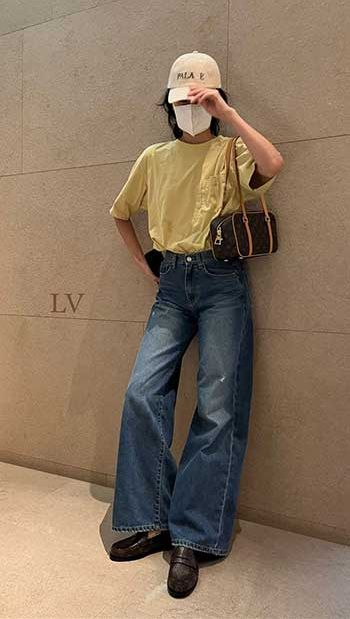Squid Game's HoYeon Jung stuns in flared jeans and £1640 bag