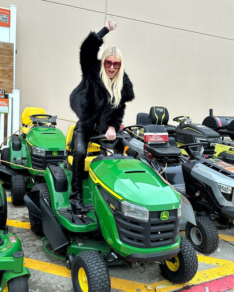 Jessica Simpson rocked a pair of leather pants and faux fur jacket as she posed on a lawn mower 