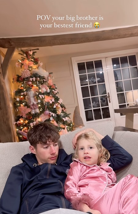 Zachary with rose on the sofa