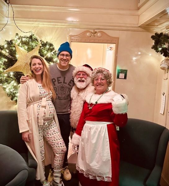ryan reynolds and blake lively with santa and mrs claus