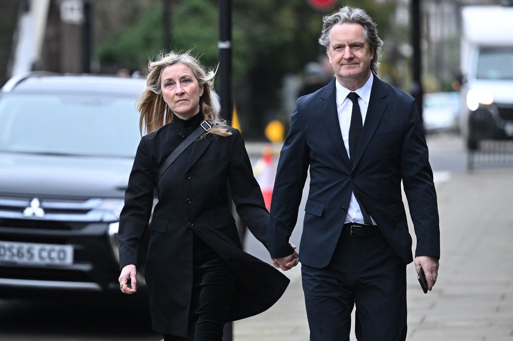 Fiona Phillips and Martin Frizell walking together in London