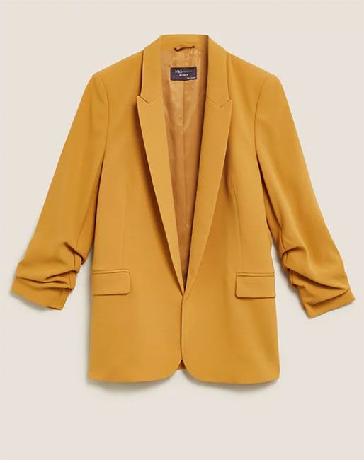 Ruth Langsford sends fans wild in sunshine yellow M&S suit | HELLO!
