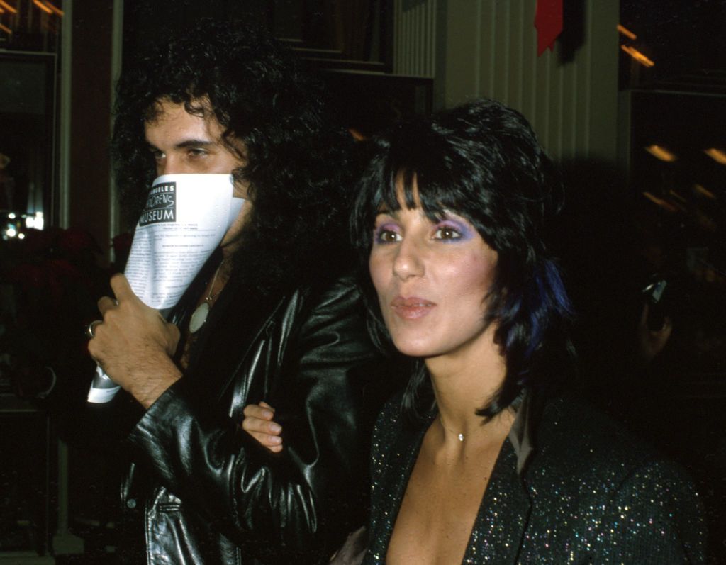When Cher and Gene appeared publicly together, often the Kiss musician had his face half-covered.