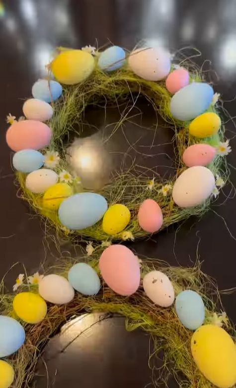Wreaths surrounded by colourful eggs