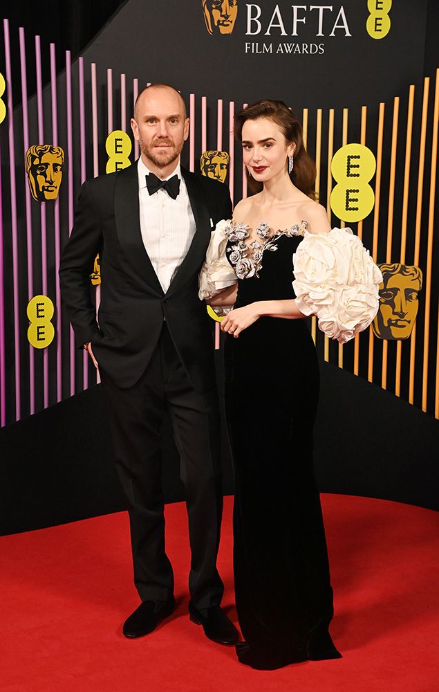 Lily Collins on the BAFTA red carpet with husband Charlie McDowell