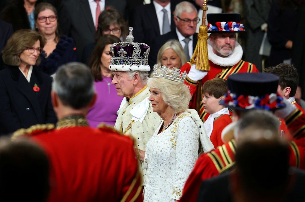king charles and camilla walking through houses of parliament
