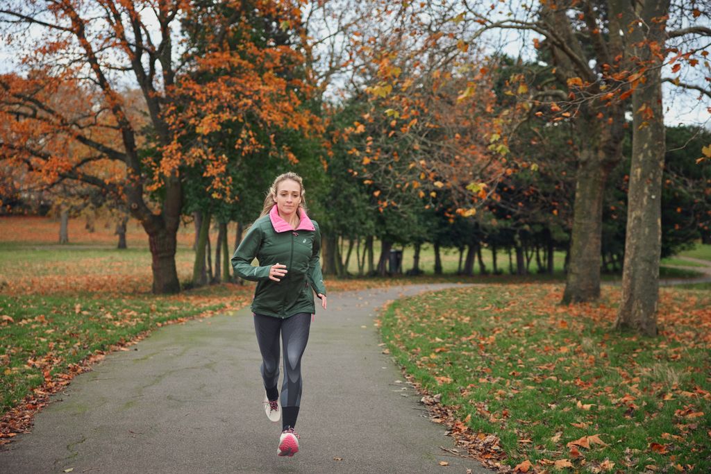 woman running outside in autumn