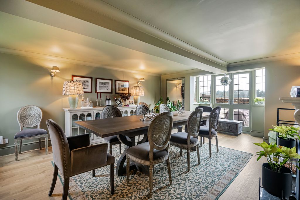 dining room with large table surrounded by chairs