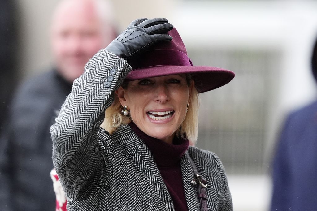Zara Tindall in rainy conditions as she arrives for Countryside Day at Cheltenham Racecourse. Forecasters have issued an amber warning for rain as Storm Claudia,