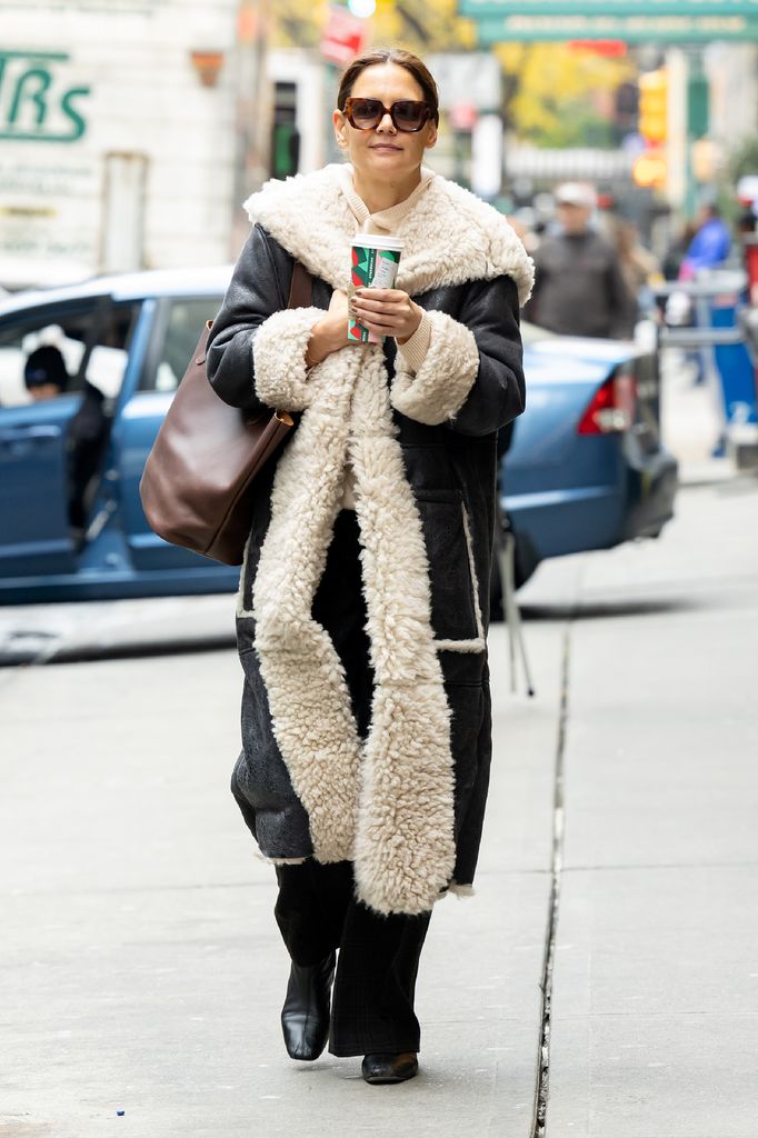 katie holmes in a shearling coat