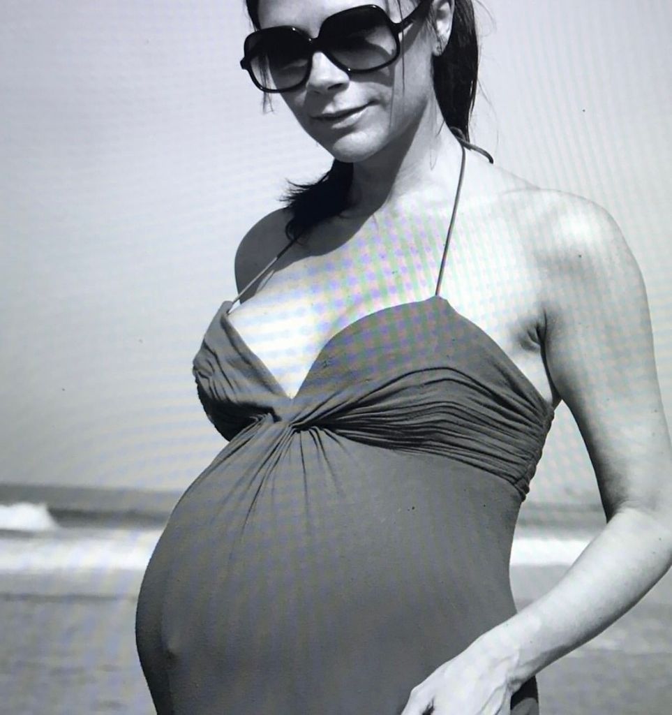 Victoria pregnant in swimsuit