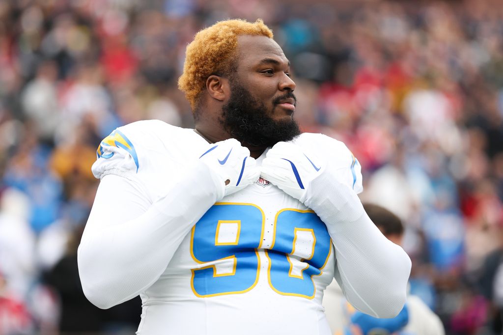 Teair Tart #90 of the Los Angeles Chargers stands on the field prior to the start of the game against the New England Patriots at Gillette Stadium on December 28, 2024 in Foxborough, Massachusetts