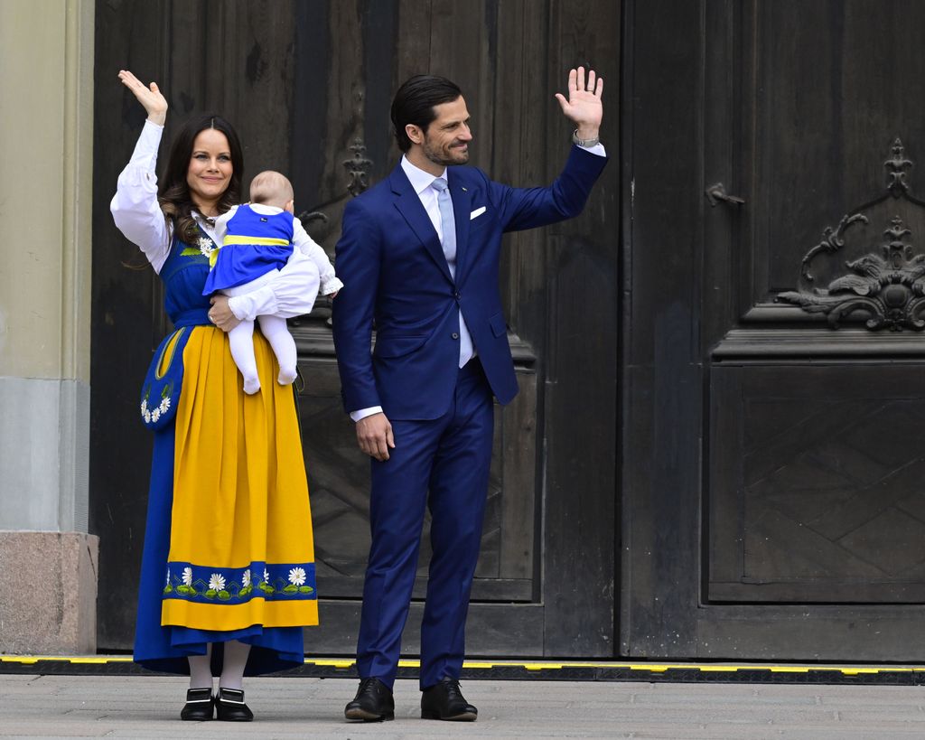Princess Sofia and Prince Carl Philip waving with baby Ines