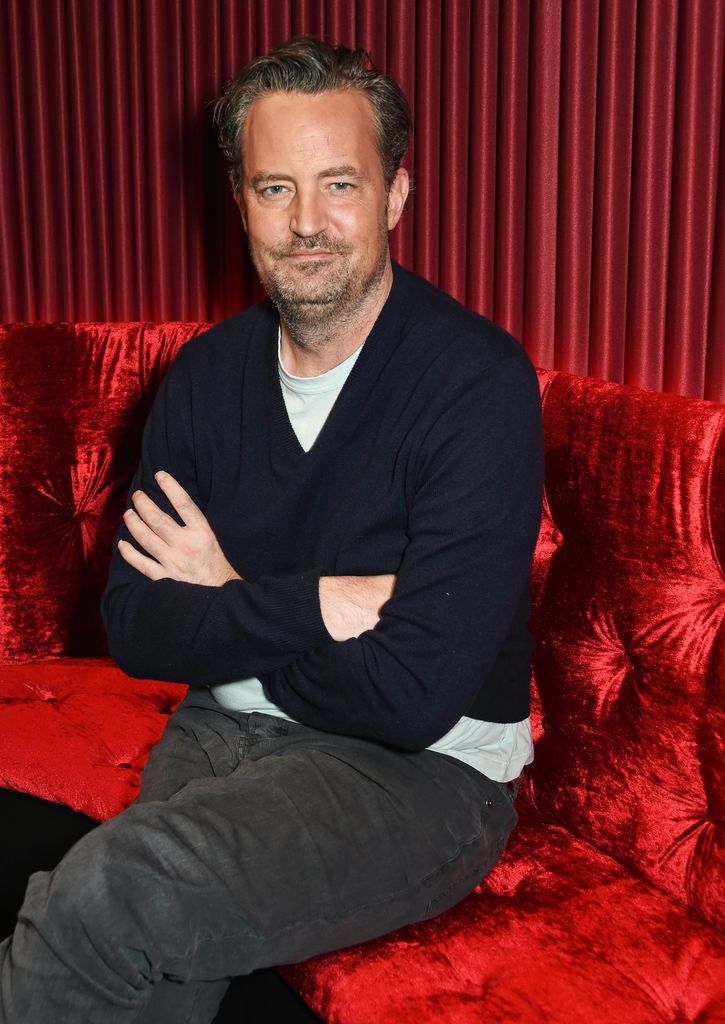 Matthew Perry poses at a photocall for "The End Of Longing", a new play which he wrote and stars in at The Playhouse Theatre in London