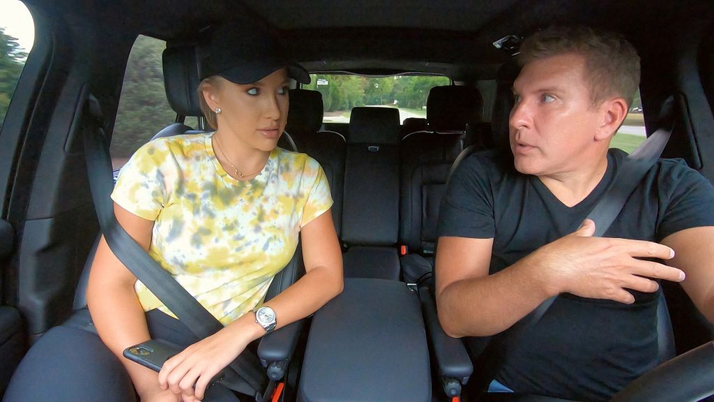 Savannah Chrisley, Todd Chrisley sit in a car in a scene from Chrisley Knows Best