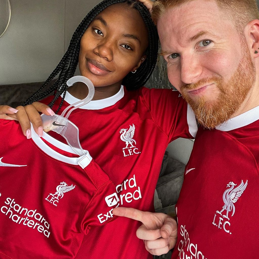 Neil Jones and Chyna Mills in Liverpool FC shirts