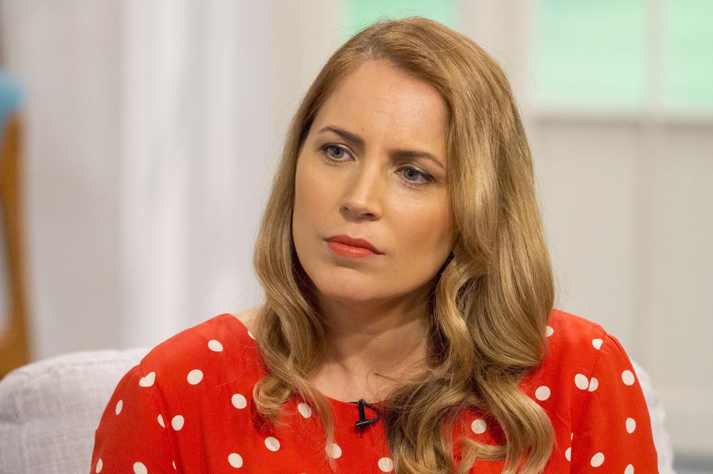 Jasmine Harman in a red polka dot outfit