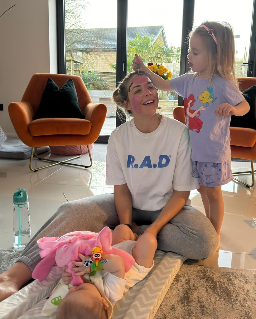 Gemma Atkinson being drawn on by her daughter Mia 