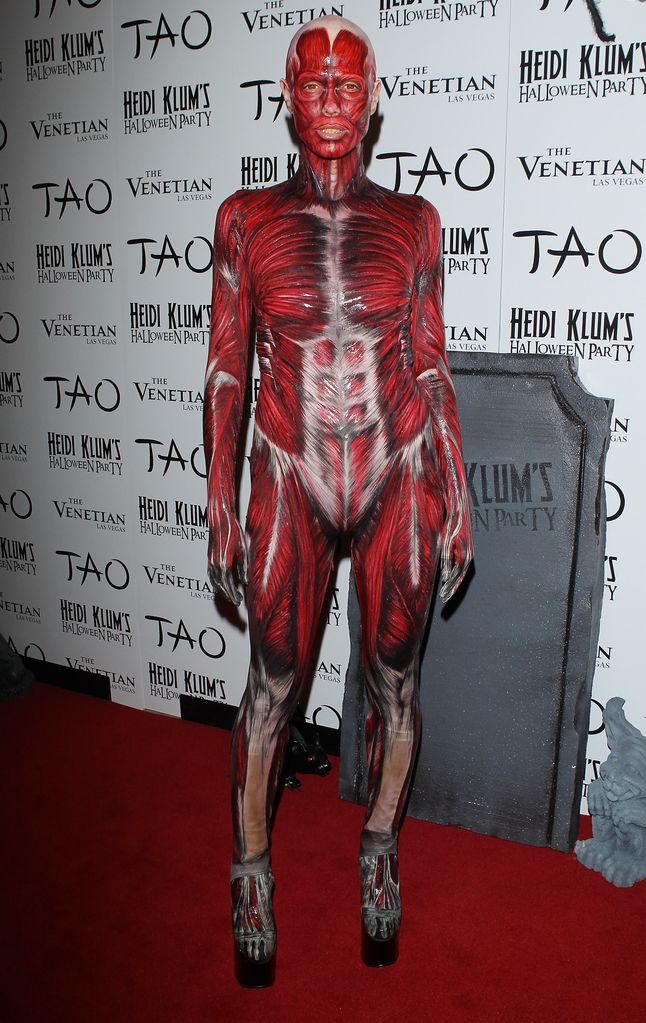 Heidi Klum dresses up as a skinless woman for her 12th annual Halloween party