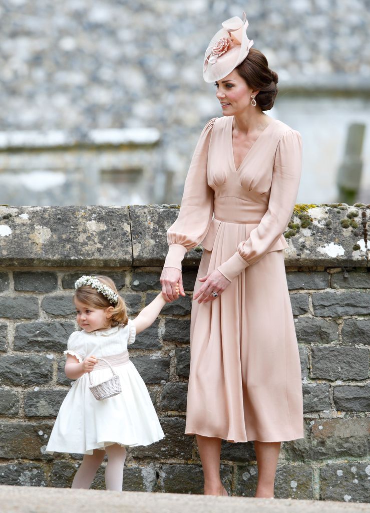 Catherine, Duchess of Cambridge and Princess Charlotte of Cambridge attend the wedding of Pippa Middleton and James Matthews at St Mark's Church 