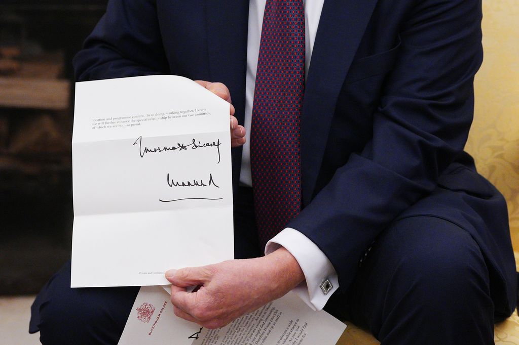 A close-up of King Charles' signature on letter to Donald Trump