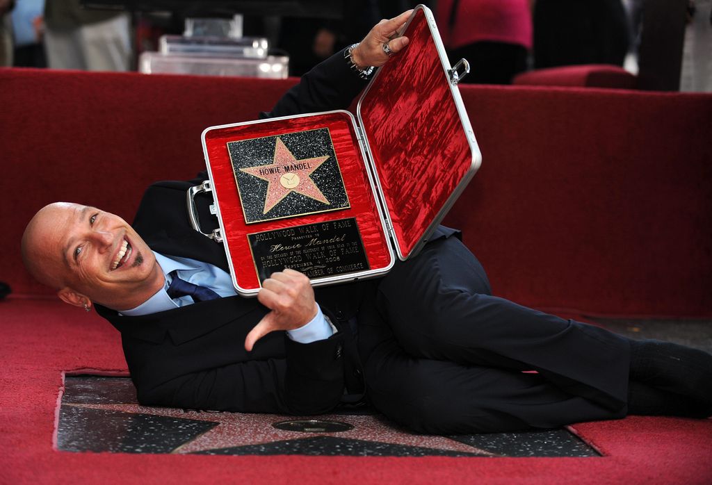 Howie Mandel, host of TV show "Deal or No Deal" on NBC poses after he received a star on the Hollywood Walk of Fame, on September 4, 2008in Hollywood, California.