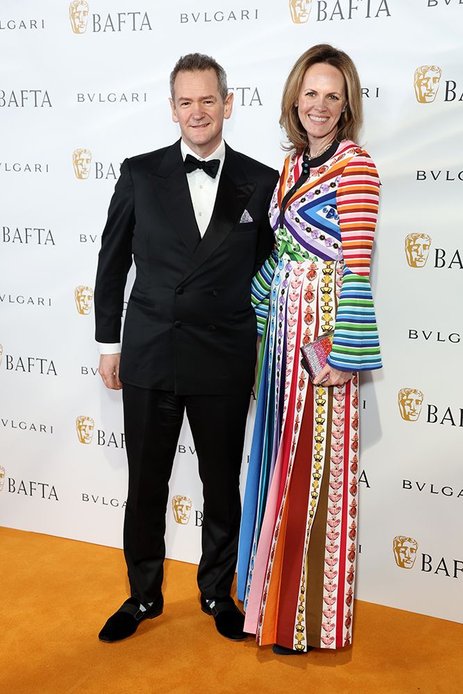 Alexander with his wife, Hannah on the orange carpet for a BAFTA dinner