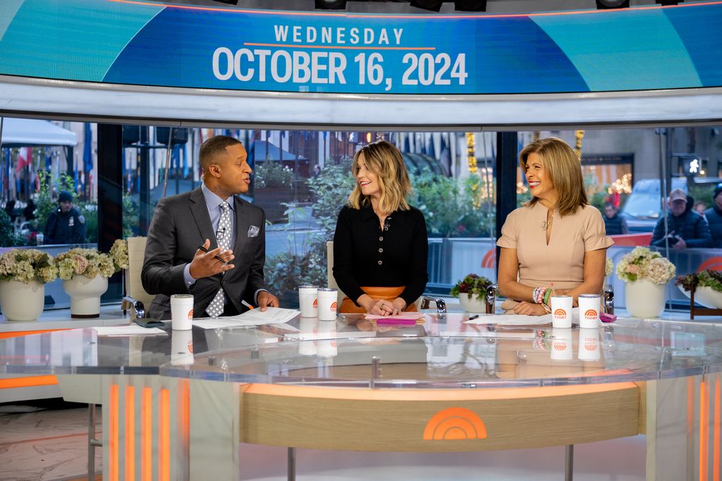 Hoda Kotb and Savannah Guthrie with Craig Melvin in the Today Show studios 