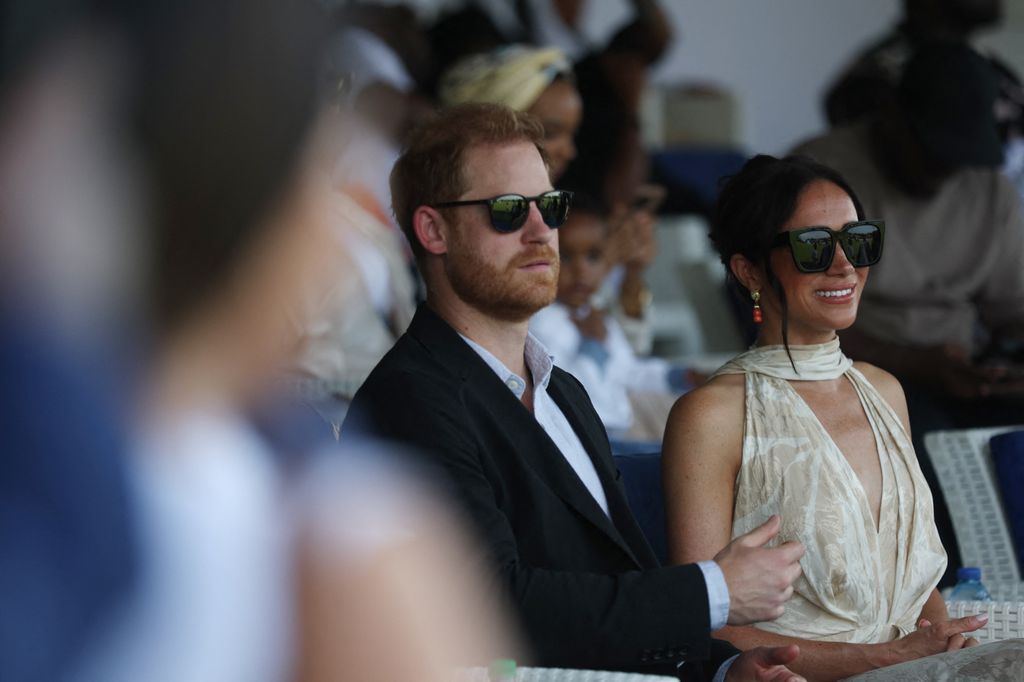 Meghan Markle and Prince Harry watching charity polo match in Nigeria