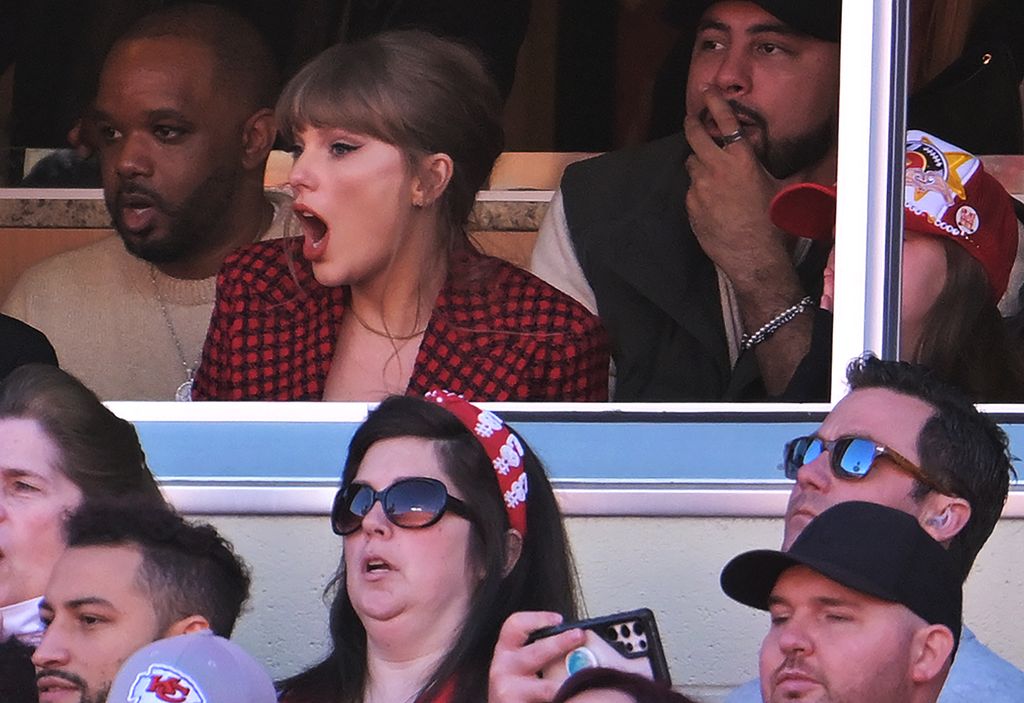 Taylor Swift cheers as the Kansas City Chiefs play the Denver Broncos 