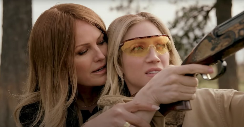 two women firing gun