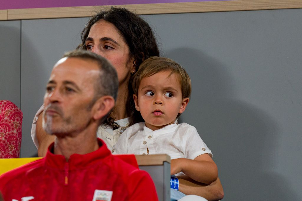  Maria Francisca Perello, wife of Rafael Nadal with their son Rafael Nadal Junior support Rafael Nadal and partner Carlos Alcaraz of Spain against Andres Molteni and Maximo Gonzalez of Argentina in the Men's Doubles first round match on day one of the Olympic Games Paris 2024 