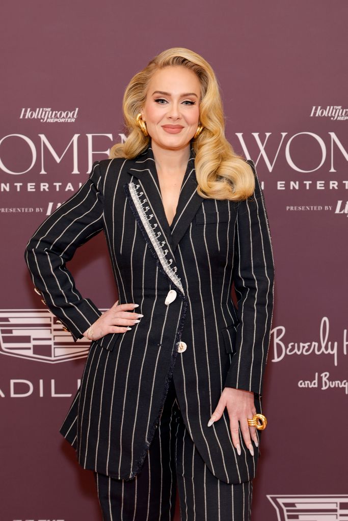 Adele on the red carpet in a striped suit
