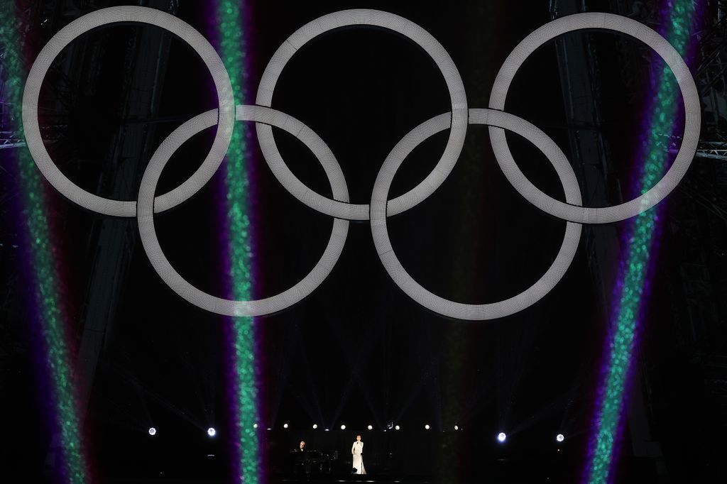 Canadian Singer Celine Dion performs on the Eiffel Tower as the conclusion of the opening ceremony of the Olympic Games Paris 2024 on July 26, 2024 in Paris, France. (Photo by Jamie Squire/Getty Images)