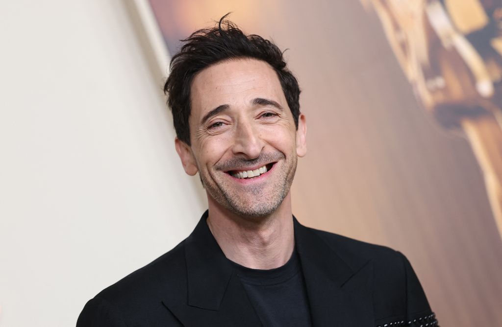 US actor Adrien Brody arrives for the 97th Annual Academy Awards Nominees Dinner at the Academy Museum of Motion Pictures in Los Angeles, February 25, 2025. (Photo by VALERIE MACON / AFP) (Photo by VALERIE MACON/AFP via Getty Images)          