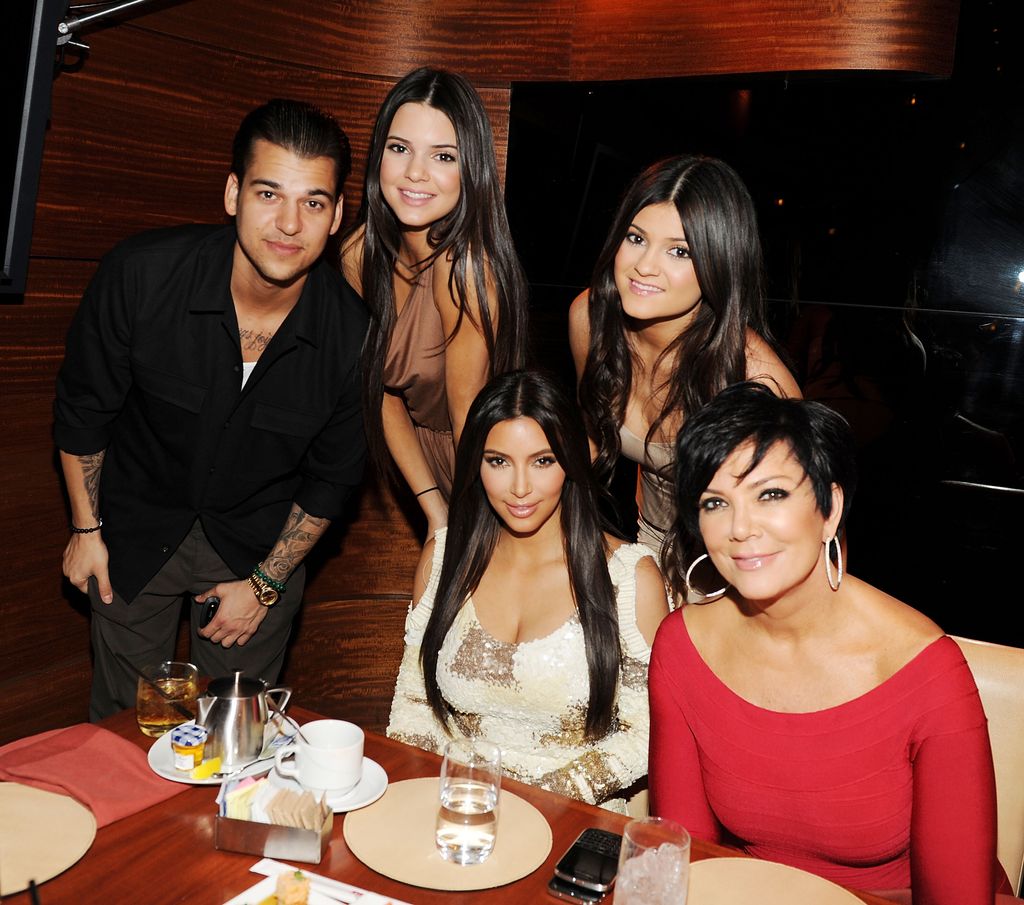 Rob Kardashian with his his sisters