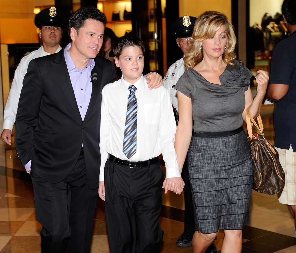 (L-R) Entertainer Donny Osmond, his son Josh Osmond, and his wife Debbie Osmond