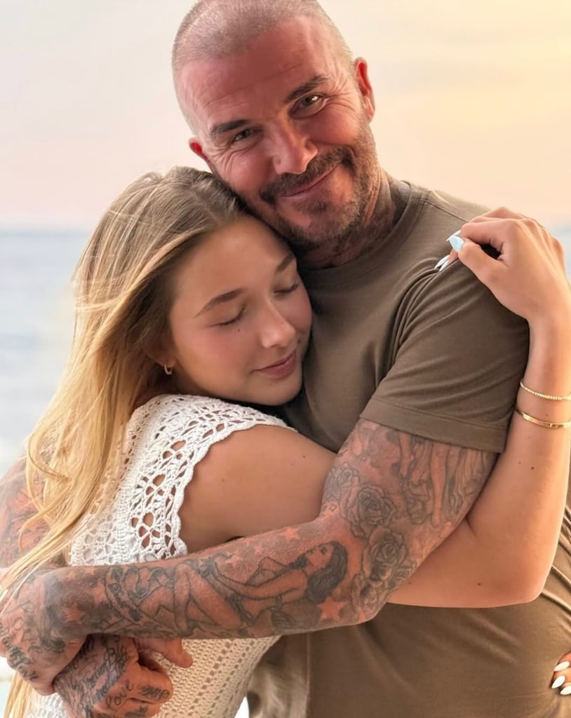 Photo shared by Victoria Beckham on Instagram of daughter Harper hugging her dad David Beckham