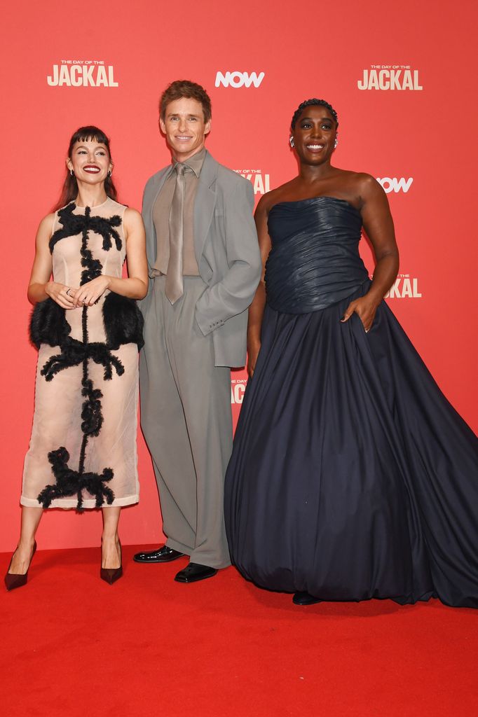 The trio were all smiles on the red carpet 