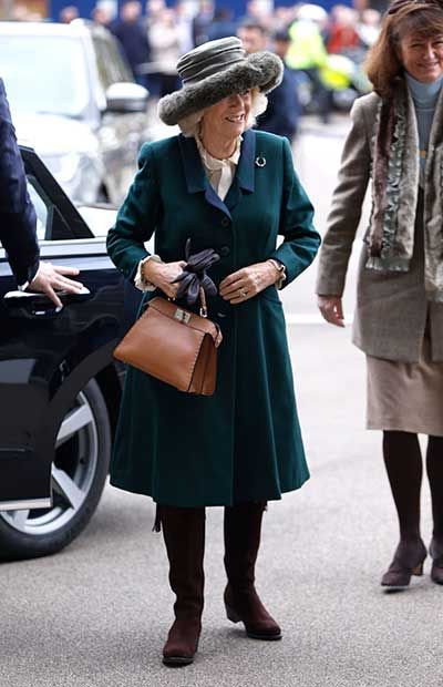 Queen Consort Camilla stuns in incredible fluffy hat and £16k brooch ...