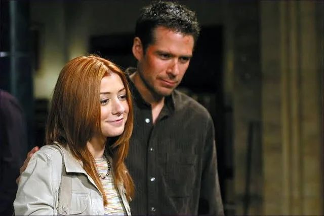 Alyson Hannigan with husband Alexis Denisof on Angel