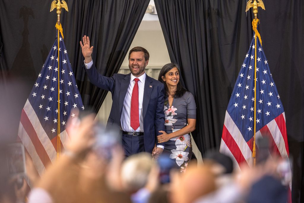 US Senator and vice presidential candidate J.D. Vance and his wife, Usha Vance, arrive for a campaign rally with former US President Republican presidential candidate Donald Trumpf in Sanford, North Carolina, on November 3, 2024