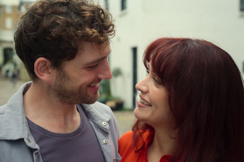 man and woman looking at each other