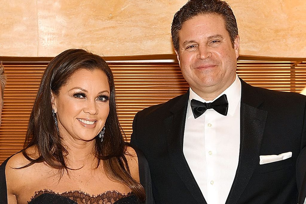 Vanessa Williams in a black dress with her husband Jim Skrip in a black tuxedo