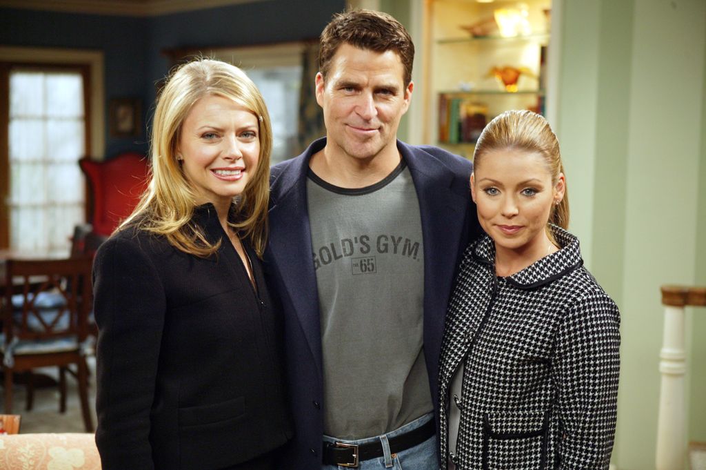  Faith Ford in black coat, Ted McGinley in navy blazer, and Kelly Ripa chequered coat at a press conference to celebrate Silvercup Studios' 20th Anniversary on the set of Hope & Faith